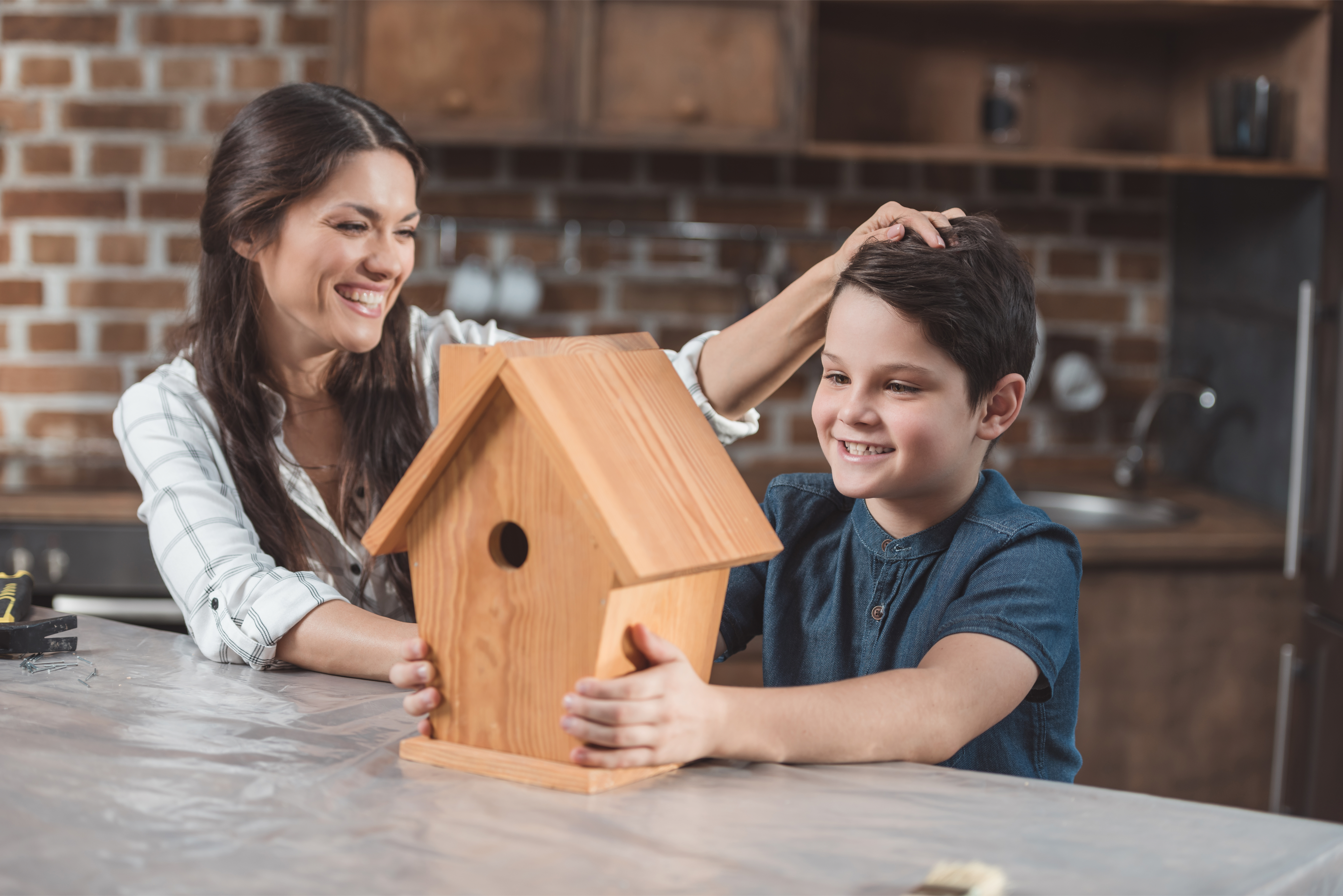 mom-son-building-birdhouse