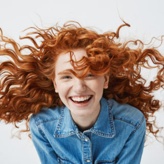 teen-girl-smiling-red-head