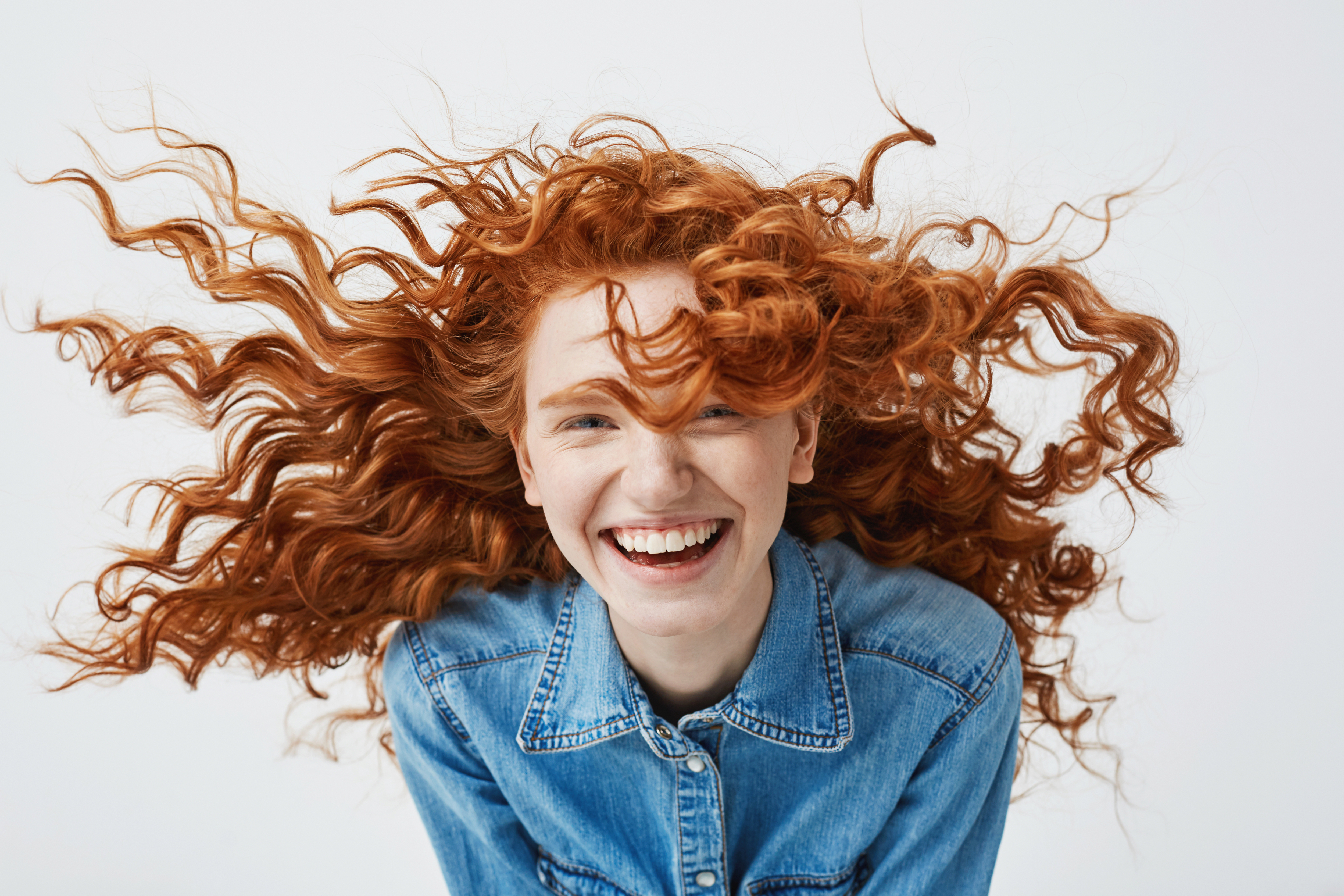 teen-girl-smiling-red-head