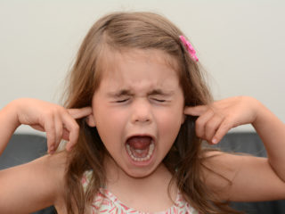 girl-plugging-ears-not-listening