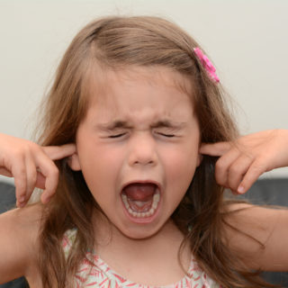girl-plugging-ears-not-listening