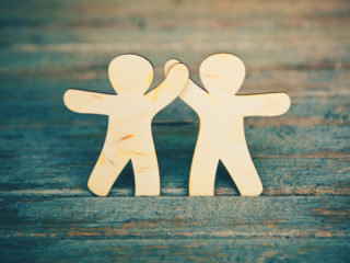 cut-out-people-holding-hands