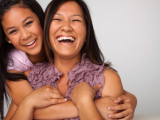 mom-teen-daughter-laugh