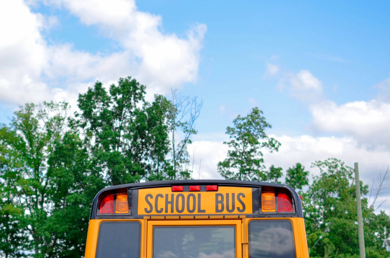 Yellow school bus and blue skies