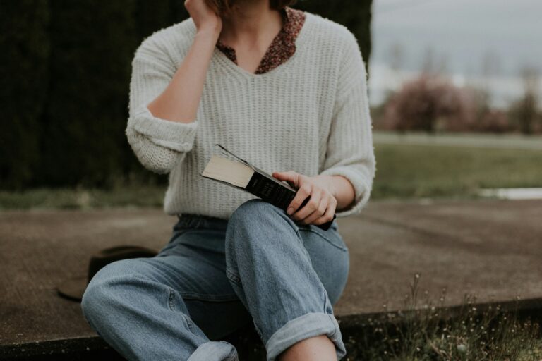 Woman sitting with bible