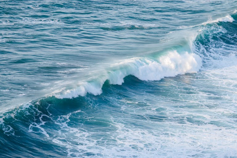 Vivid image of a crashing ocean wave showcasing nature's power and beauty.
