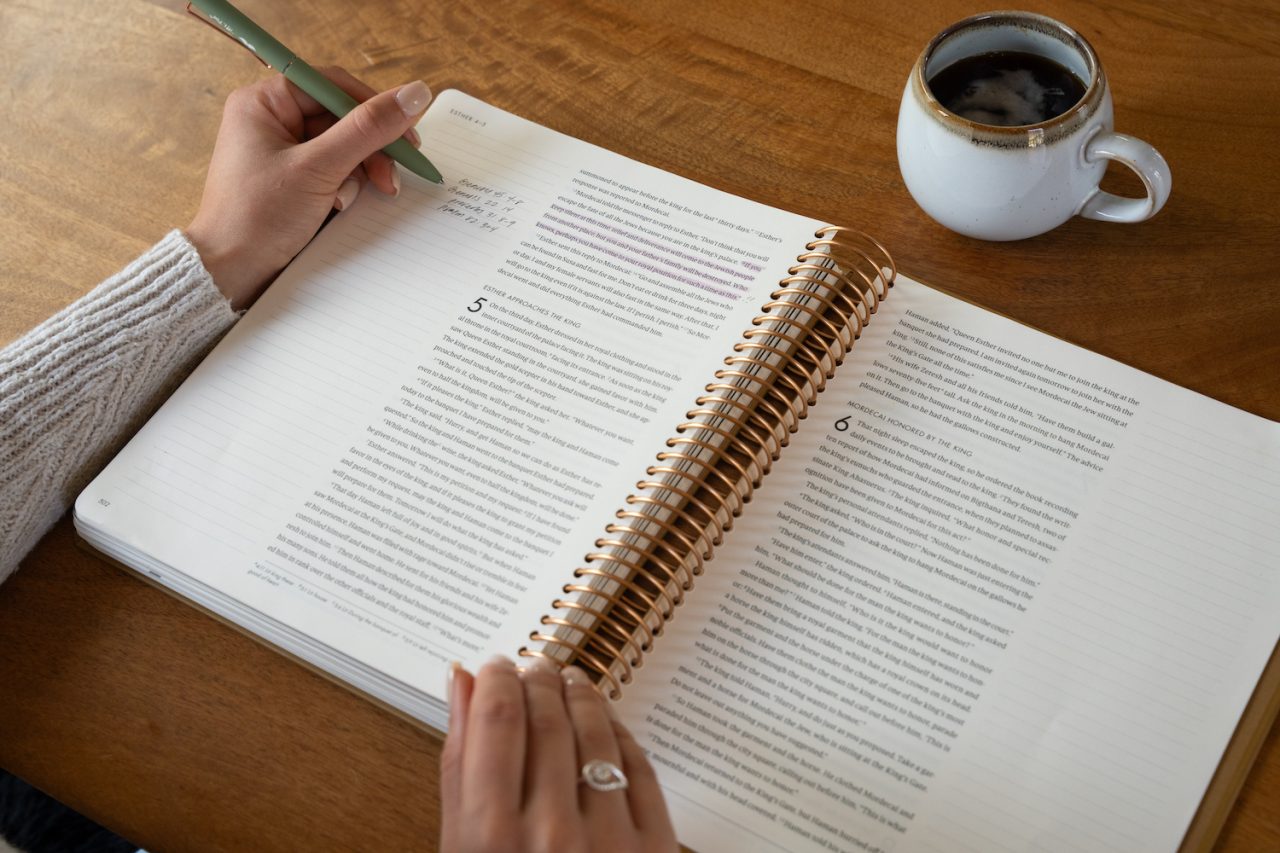 She reads truth spiral bible open on table - Christian mother's day gifts