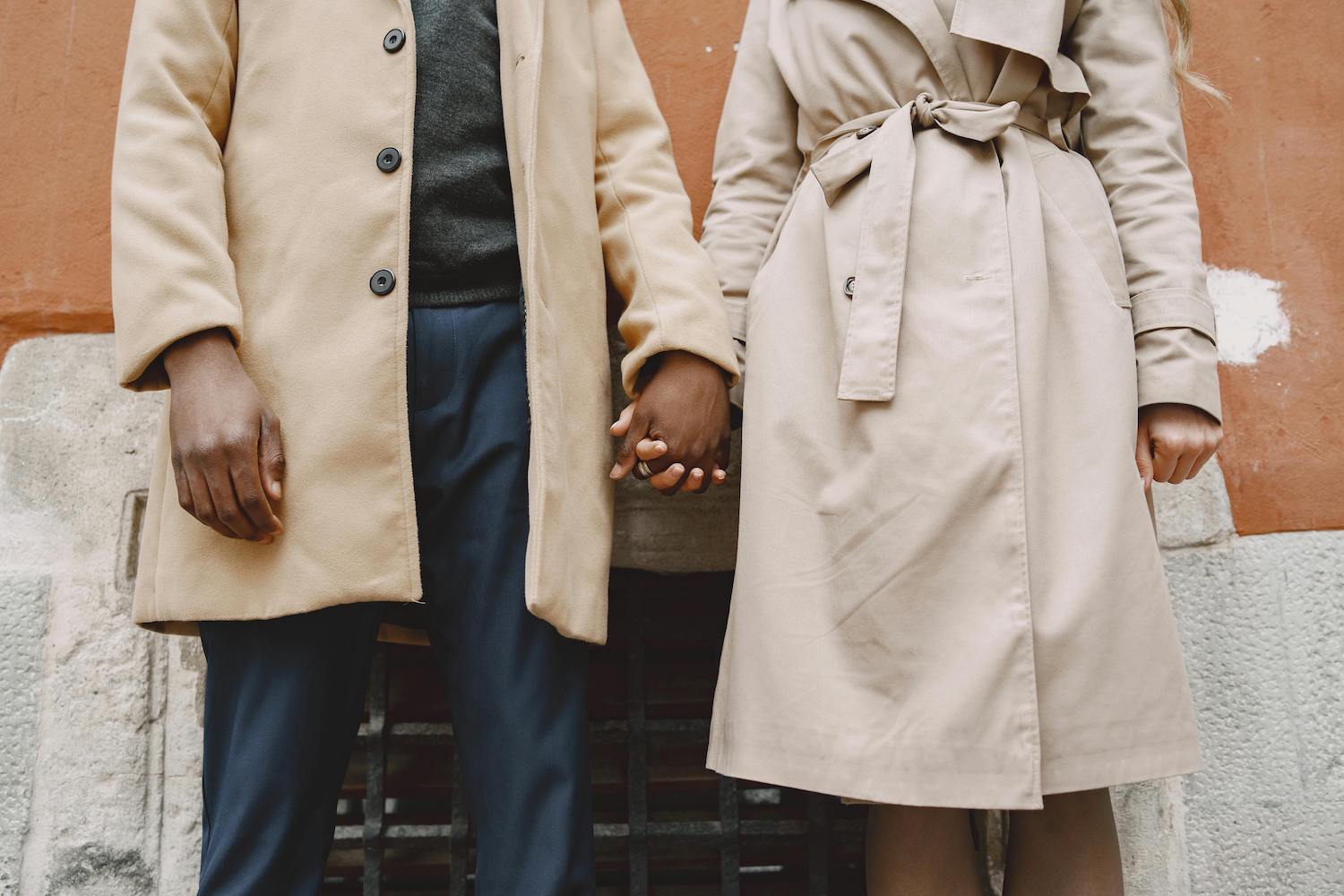 Biblical submission - man and wife in coats holding hands