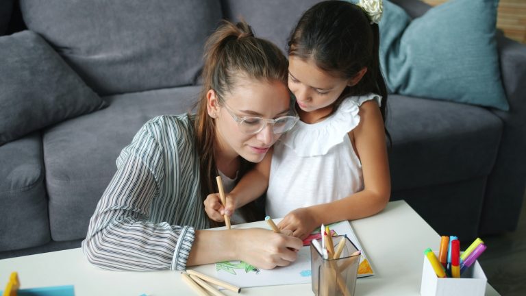 Mom drawing with daughter spending one-on-one time with your child