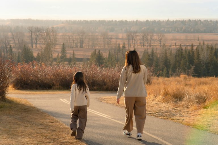 Mom and daughter walking on path - What to Do When You Find Yourself Divorced and Navigating Single Motherhood